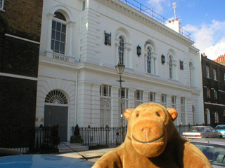 Mr Monkey looking at the old Finsbury Bank