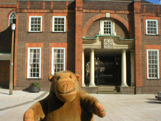 Mr Monkey outside the church of the priory of St John
