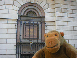 Mr Monkey looking at the monument to the Protestant Martyrs