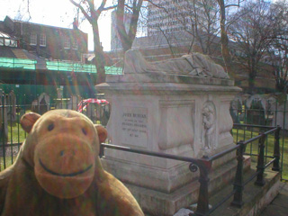 Mr Monkey looking at John Bunyan's tomb