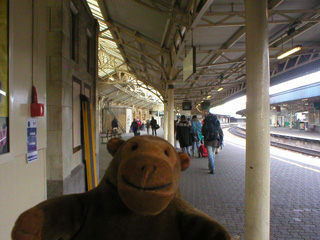 Mr Monkey on a platform at Temple Meads station