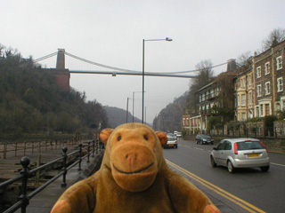 Mr Monkey looking up at Clifton Suspension Bridge