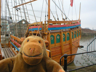Mr Monkey examining the rear of the Matthew from the quay
