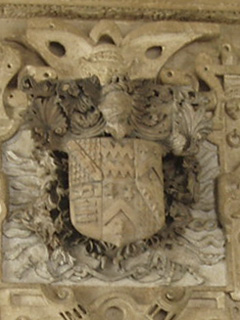 The arms of Sir John Younge on a fireplace
