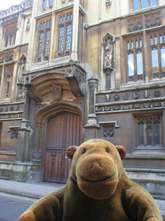 Mr Monkey looking at the front of the old Guildhall