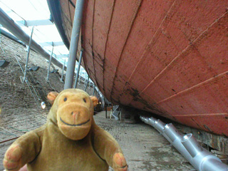 Mr Monkey looking along the hull of the S.S. Great Britain