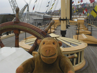 Mr Monkey beside the wheel of the S.S. Great Britain