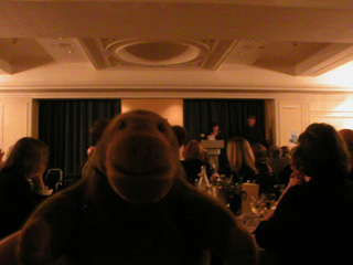 Mr Monkey listening to speeches after the dinner