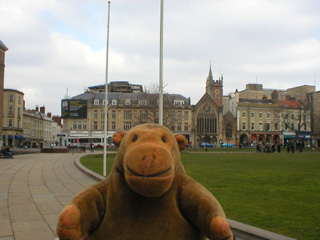 Mr Monkey looking at the Lord Mayor's Chapel across College Green