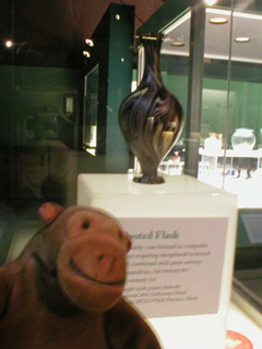 Mr Monkey examined an ancient glass flask