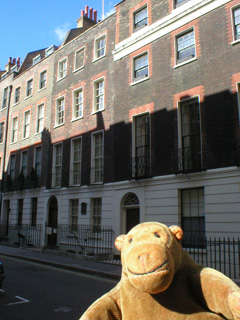 Mr Monkey looking down Craven Street