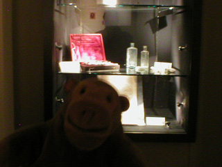 Mr Monkey examining some medical instruments