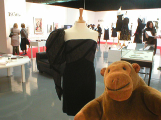 Mr Monkey looking at Chanel Boutique dress