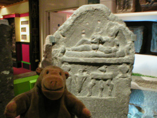 Mr Monkey with a Roman tombstone
