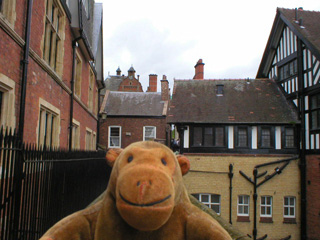 Mr Monkey approaching Eastgate along the Chester walls