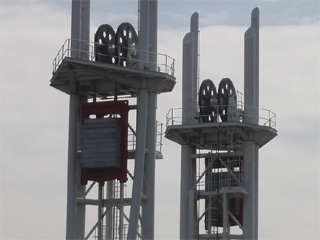 Counterweights and winches at the top of the Lowry lifting footbridge