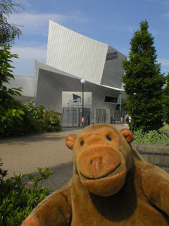 Mr Monkey looking at the Imperial War Museum North building