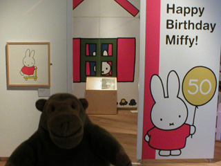 Mr Monkey walking into the Miffy birthday exhibition