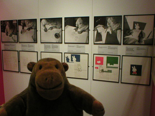 Mr Monkey with a display showing Dick Bruna drawing Miffy