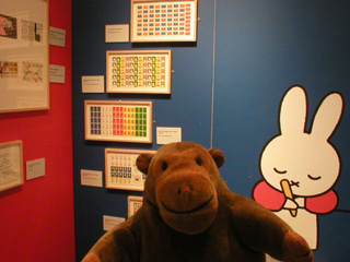 Mr Monkey with a selection of Miffy stamps, and a picture of Miffy writing
