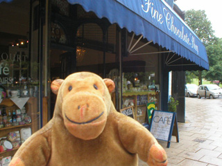 Mr Monkey outside Farrahs food hall