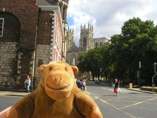 Mr Monkey looking at the towers of York Minster