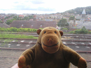 Mr Monkey looking at Scarborough from the train