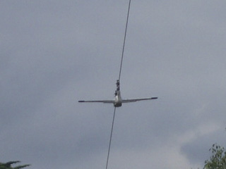 A plane sliding down a cable