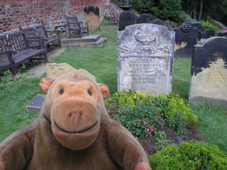 Mr Monkey looking Anne Bronte's grave