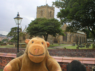 Mr Monkey looking at St Mary's church