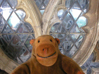 Mr Monkey looking the glass of the east front