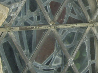 A section of stained glass, viewed from the outside