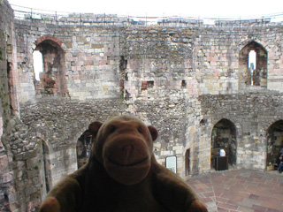 Mr Monkey looking at the inside of Clifford's Tower from part way up