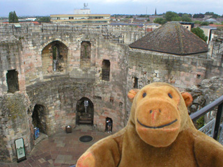 Mr Monkey looking at the inside of Clifford's Tower from the wall walk
