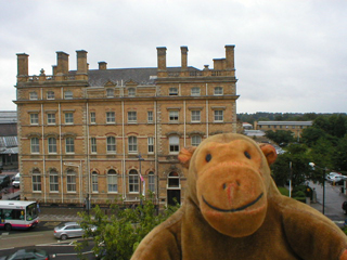 Mr Monkey looking at the Royal York Hotel from the city walls
