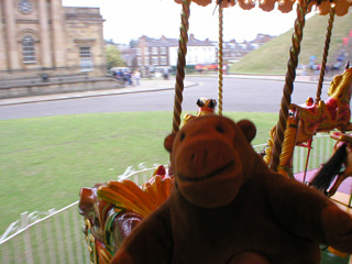 Mr Monkey riding on a Golden Galloping Horse