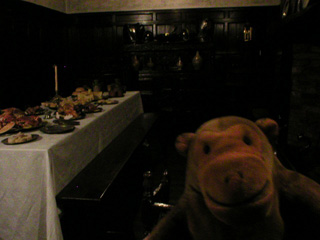Mr Monkey looking at a Jacobean dining room