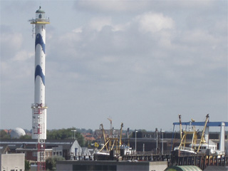 The lighthouse across the harbour