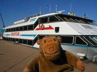 Mr Monkey on the quay beside the Seastar