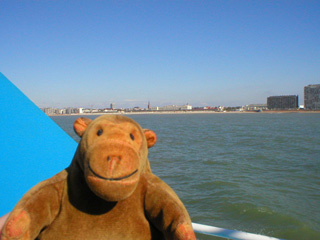 Mr Monkey looking at the coast from the back of the Seastar