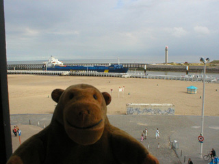 Mr Monkey watching a ferry from his hotel