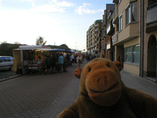 Mr Monkey looking at the market on Dorpsstraat