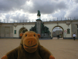 Mr Monkey looking at the monument to Leopold II