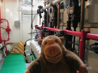Mr Monkey in the engine room of the Amandine