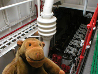 Mr Monkey on an upper catwalk in the engine room