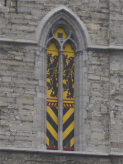 Shutters on the Belfort, decorated with a black lion on a yellow field