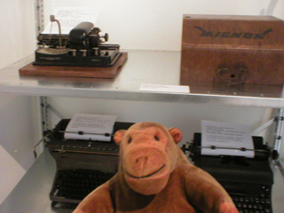 Mr Monkey with some vintage typewriters
