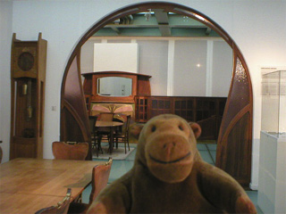 Mr Monkey looking at an Art Deco room