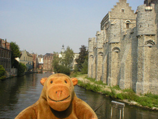 Mr Monkey looking at the river Lieve beside the Gravensteen