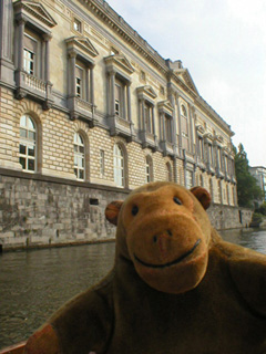 Mr Monkey passing the Palais de Justice
